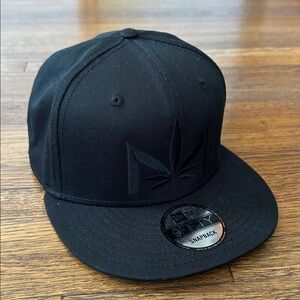 Black Snapback Hat with Leaf Design
